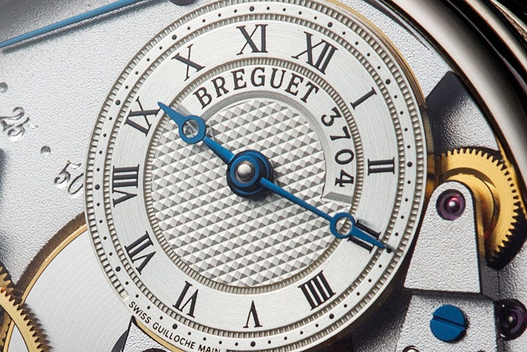 The dial has been shrunk to fit most of the movement in on the dial side