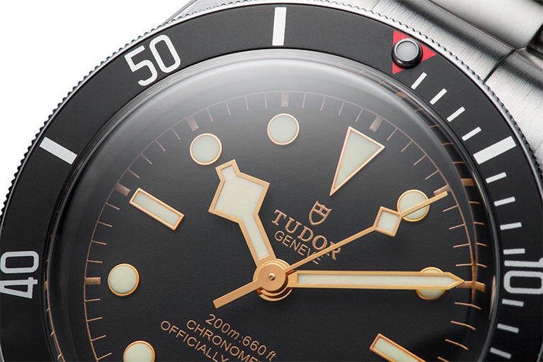 The Tudor can't quite match the Rolex for quality, but its vintage details add charm